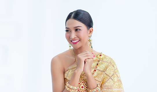 The girl in Thai costume is cute and beautiful like Thai Smile.