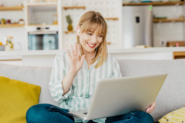 istock Young woman on a video call at home 1286533976