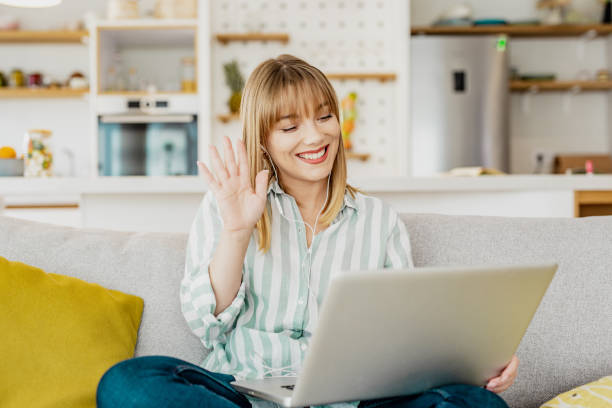 istock Young woman on a video call at home 1286534097