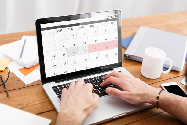 istock Man Working With Calender Planner On Laptop In Office, Managing Business Schedule 1286534273