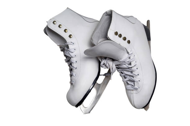 Lace up a white figured ice skate.