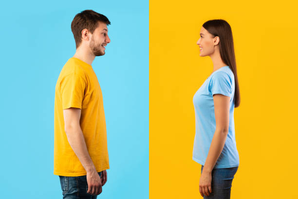 istock Profile portrait of couple looking at each other 1286534936