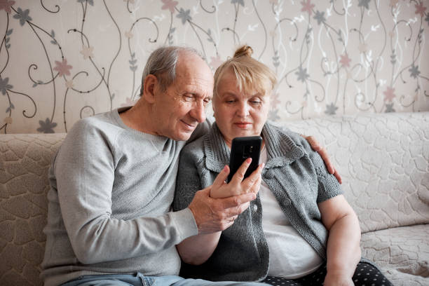 istock an elderly couple talks on a video call with their family during the quarantine 1286536505