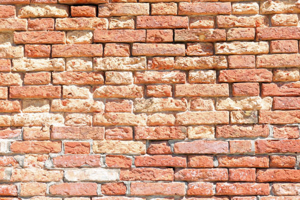 istock rough wall made of red bricks and mortar and concrete ideal as a 1286536598