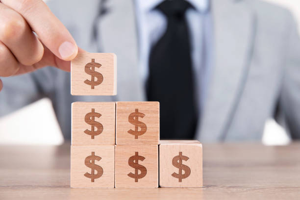 istock Finance and Economy Concept with Wood Cubes 1286539633