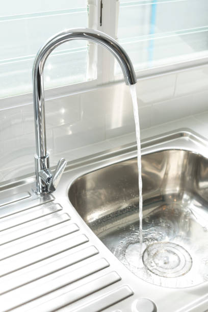 istock A running tap water in the kitchen. 1286540390