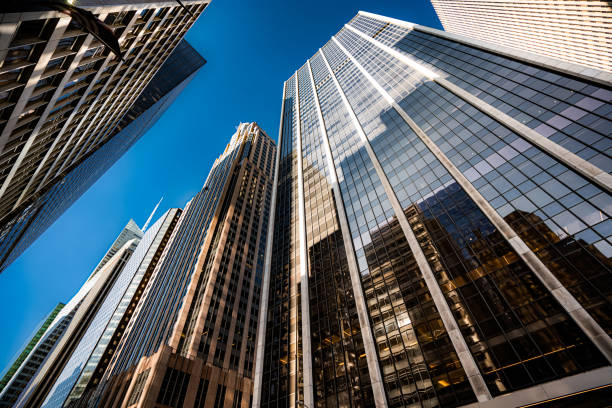 istock Low angle view of modern skyscrapers in Midtown Manhattan 1286541431