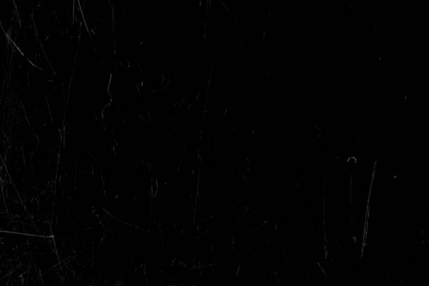 istock Black film with scratches. Background for design. 1286549084