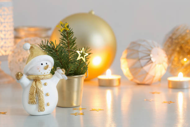 istock Christmas decorations with little ceramic snowman 1286549584