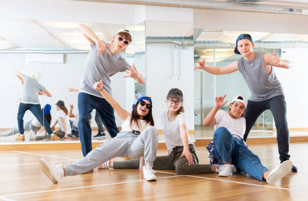 istock Teens hip hop dancers posing in studio 1286549693