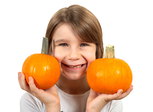 Cute Boy Holding Small Pumpkins