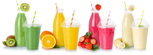 istock Drinks drink beverages smoothie smoothies fruit juice straw in a bottle and cup isolated 1286558784