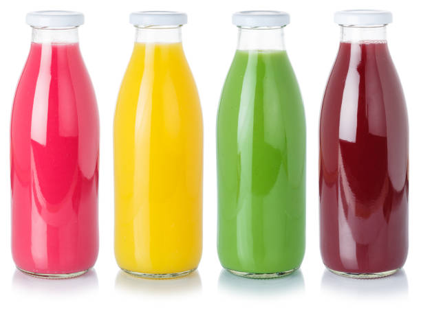istock Fresh fruit juice drink drinks in a bottle healthy eating isolated on white 1286558885