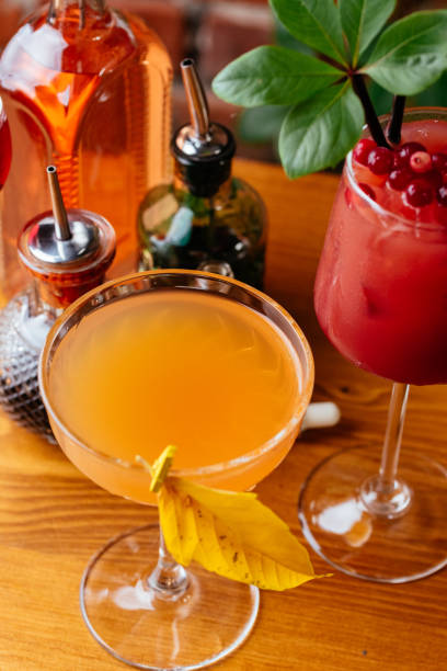 istock autumn cocktails on a brick wall background 1286558941