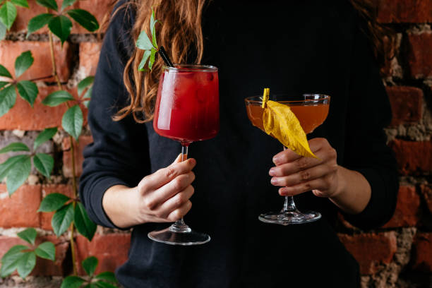 istock autumn cocktails in women's hands 1286558961