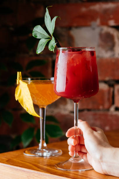 istock autumn cocktails in women's hands 1286558974