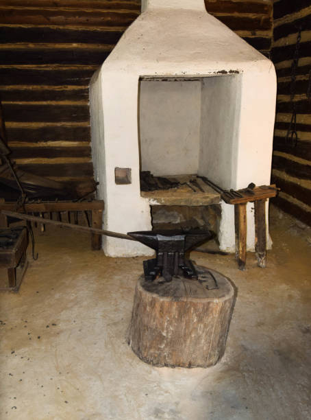 istock Room of the blacksmith with oven, anvil and other utensils for iron processing. 1286561597