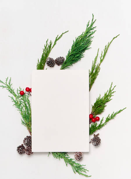 Christmas card mockup. Paper blank mock up, gift boxes, decorations, isolated on white. christmas paper photos stock pictures, royalty-free photos & images