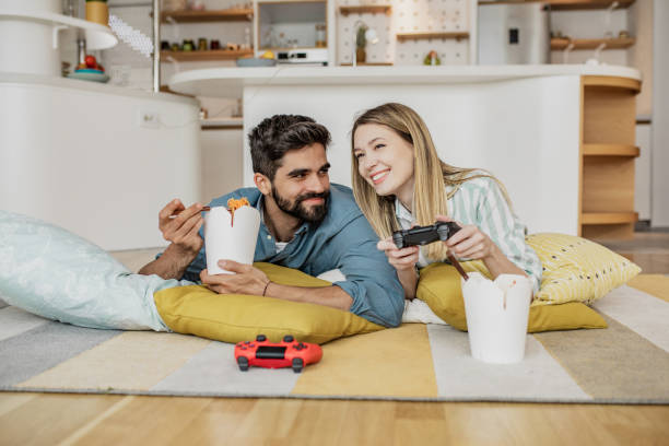istock Young couple is playing video games 1286562835