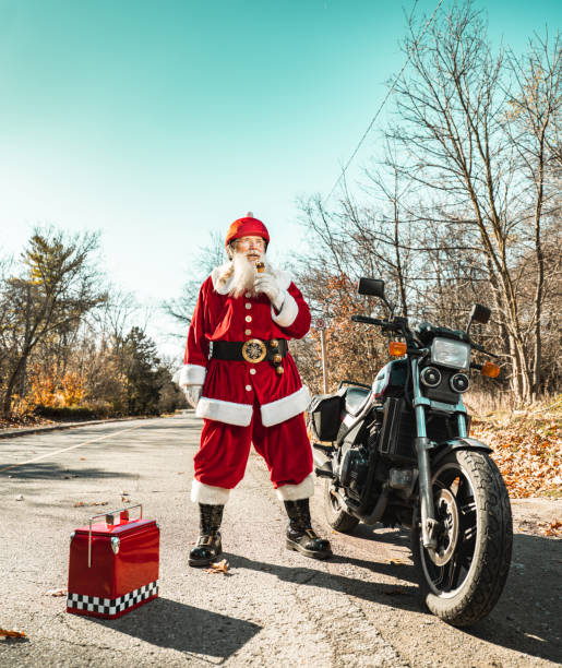 istock Santa Claus taking a break on the road 1286563169