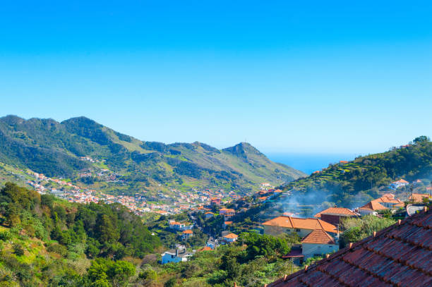 istock Maderia village ocean mountains perspective 1286564132