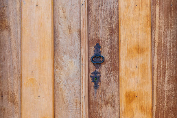 Old wooden gate texture with metal details