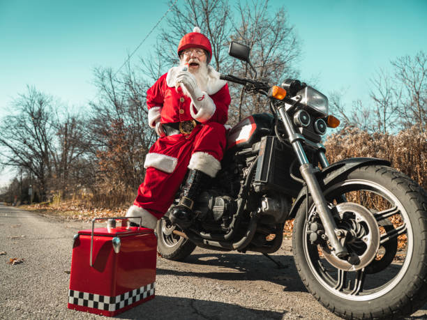 istock Santa Claus taking a break on the road 1286564958