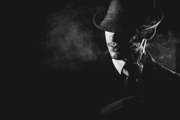istock Retro man in tie and hat smoking 1286567992