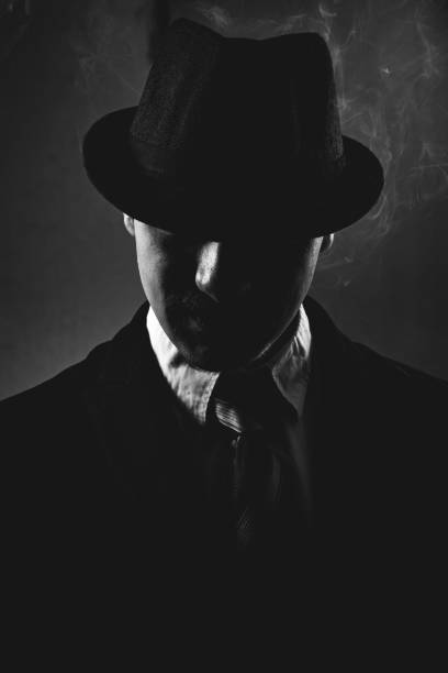istock Retro man in suit wears hat and tie 1286568864