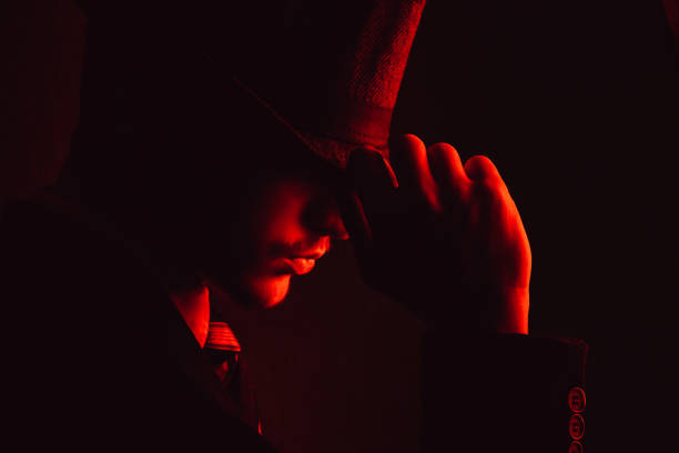 istock Retro man in hat wears suit and tie 1286569056