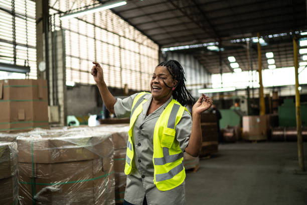 istock Happy mature woman dancing in a industry 1286569233