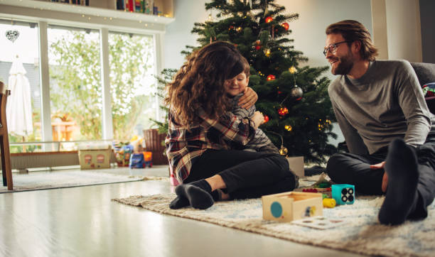 istock Family having happy time on Christmas 1286570395