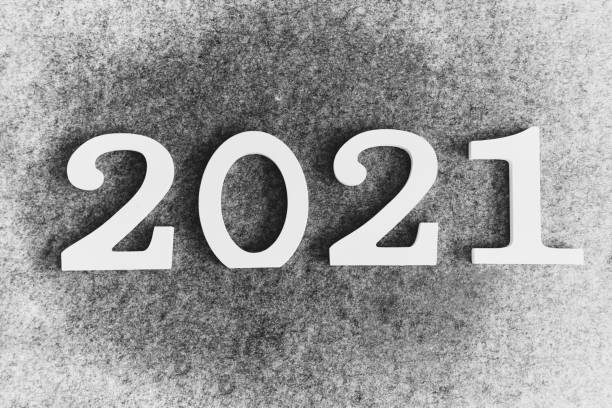 istock New Year theme. Numbers 2021 on a gray background. 1286574978