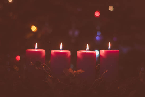 istock Advent candles concept with burning candles 1286577600