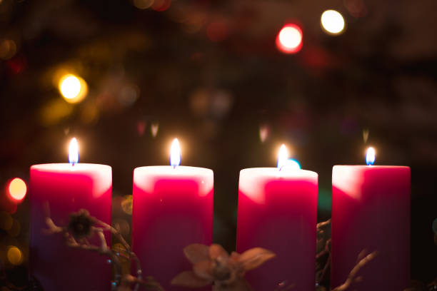 istock Advent candles concept with burning candles 1286577640