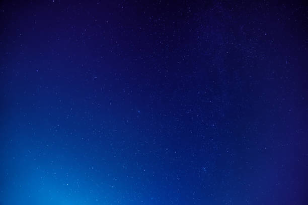 istock Night sky background with many shining stars, endless space concept 1286583749