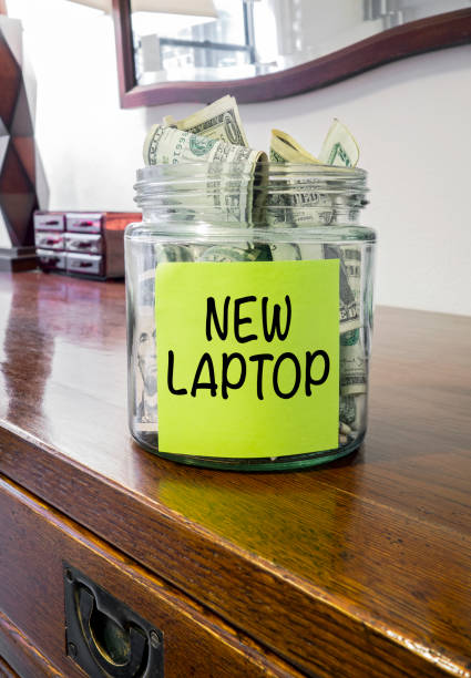 istock Saving money for new laptop 1286585892