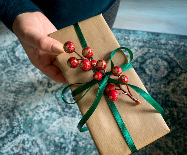 istock Giving a present gift box for a special day. Happy holiday background. 1286587593
