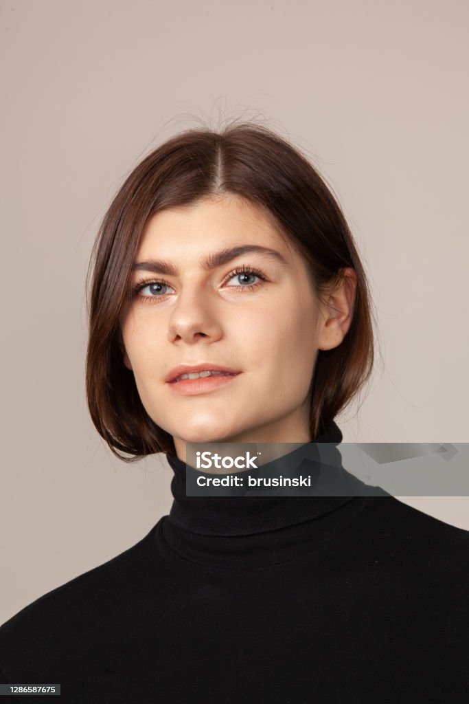 Studio Portrait Of An Attractive 20 Year Old Woman Stock Photo
