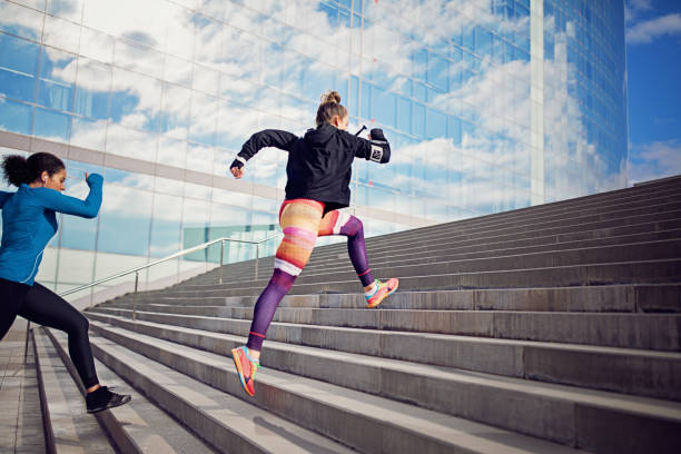istock Runner women are sprinting in a competition 1286587750