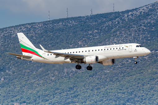 Athens, Greece - September 22, 2020: Bulgaria Air Embraer 190 airplane Athens Airport in Greece.