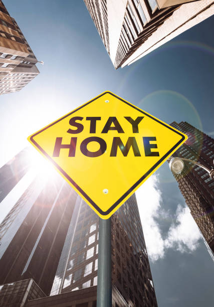 istock stay home street sign 1286588806