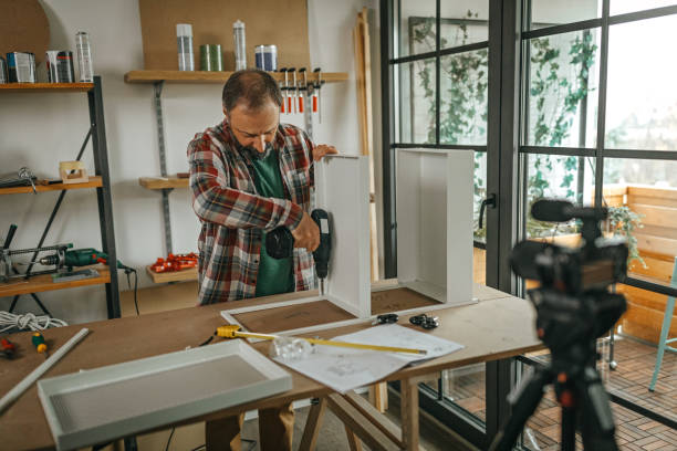istock Mature man recording video for his vlog at home 1286589708