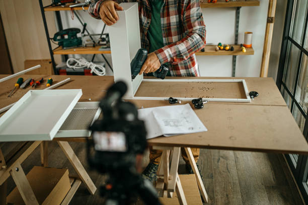 istock Mature influencer vlogging about diy project from home 1286589733