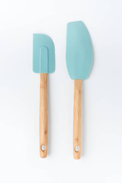 Kitchen Spatula and Mixer Scraper Set Silicone mixer and scraper Spatula with bamboo handle on a white background Spatula stock pictures, royalty-free photos & images