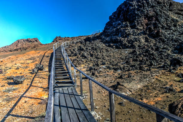 istock Dramatic orange and black lava rock along the pathways on Bartolome Island in the Galapagos Islands 1286597383