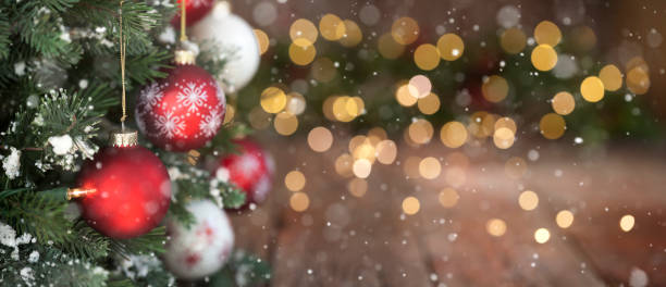 istock Christmas Tree, Red and White Ornaments against a Defocused Lights Background 1286600989
