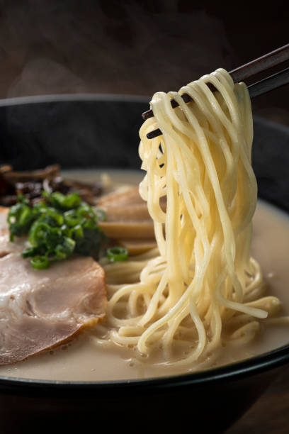 Hot pork bone ramen on the table Hot pork bone ramen on the table auriculariales photos stock pictures, royalty-free photos & images