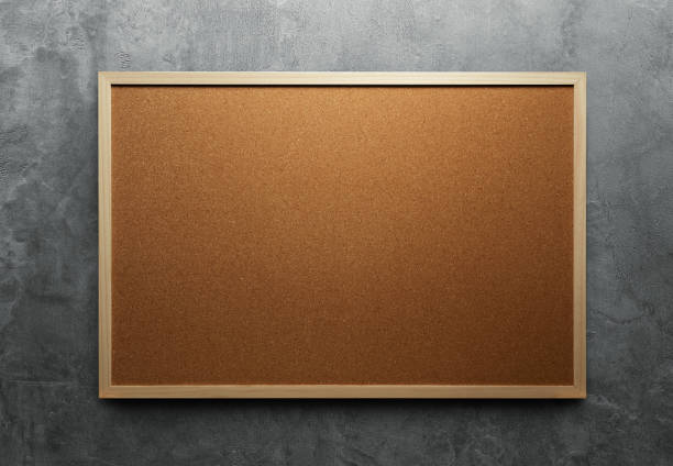 istock Blank corkboard with a wooden frame on the concrete wall 1286606808