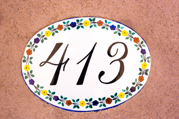 istock Ceramic Number 413 Street Address Tiles, Tan Wall 1286606911